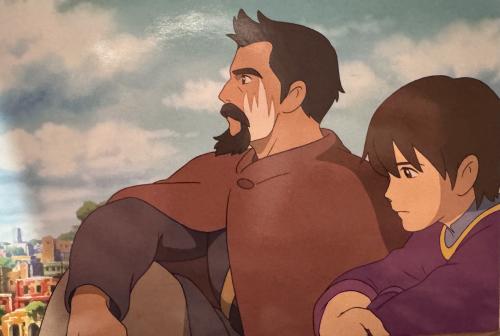 A close up shot of a man with a beard and a woman looking at him