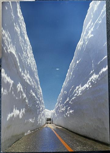 Winter road with snow and blue sky in the background. High quality photo