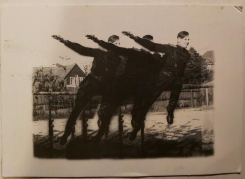 An antique photo shows a group of soldiers