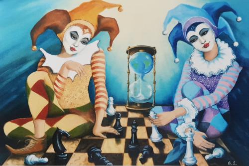 Clowns playing chess on a chessboard. Conceptual image.
