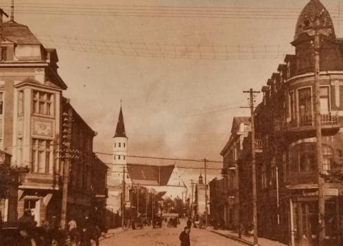 Vintage postcard shows a street in Rotterdam