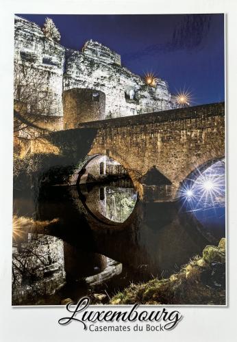 Postcard printed in Ljubljana, Slovenia shows the old bridge over the river.