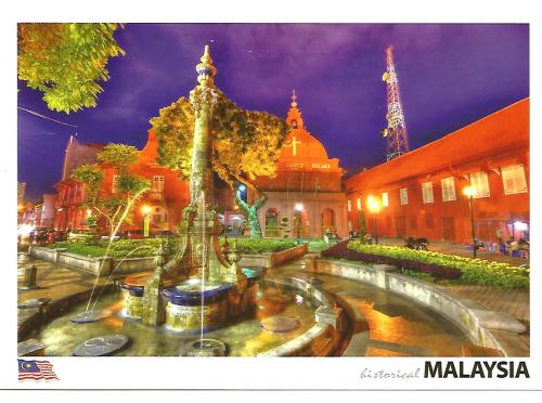 Malaysia travel postcard with famous Ratchaburi temple at night