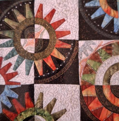 Abstract background from the pieces of quilt in the form of a circle