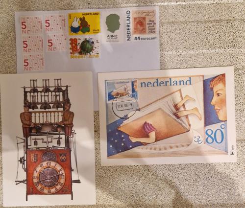 Vintage telephone and postcards from the 1950s and 1960s