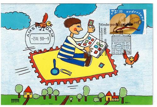 USSR - CIRCA 1988: A postcard printed in the USSR shows a boy playing the guitar, circa 1988.