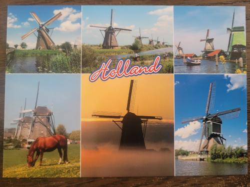 Set of postcards with the image of windmills and horses