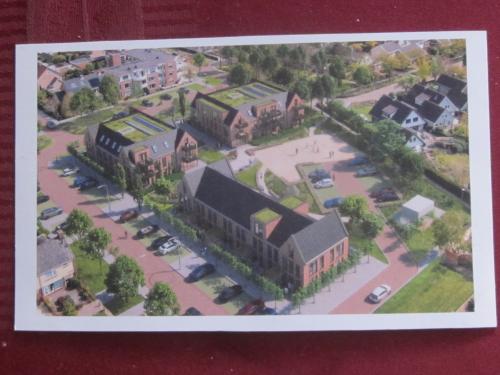 Aerial view of a residential neighborhood with a lot of houses.
