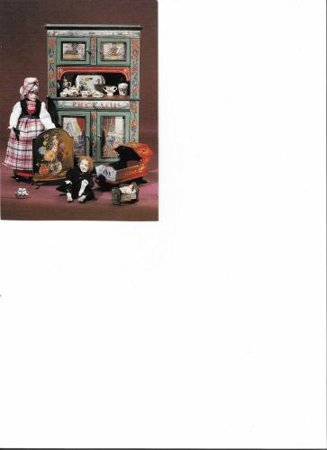 The image of an old photo album with a picture of an old man in a Scottish costume.
