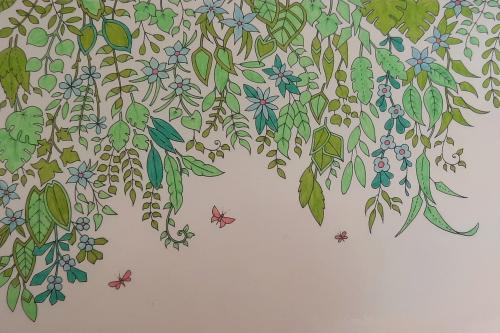 Hand drawn pattern with flowers, leaves and butterflies on a white background