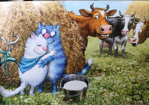 Cute animals painted on the wall of a farm with cows and bulls