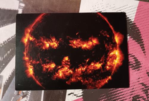 Photo of a fire in the form of a circle on a black background