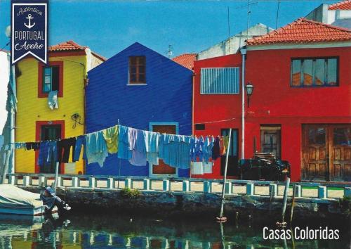 A painting of the colorful houses in Burano, Venice, Italy.