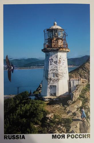 Vintage postcard with the image of a lighthouse in Cancun
