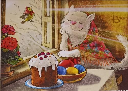 Easter cake and painted eggs on the windowsill. A cat sits next to the table.