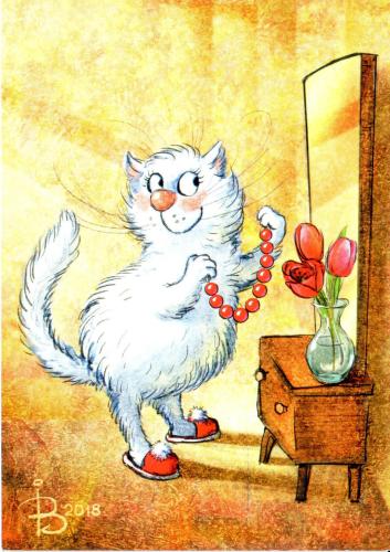 White cat with red beads and a glass vase of tulips