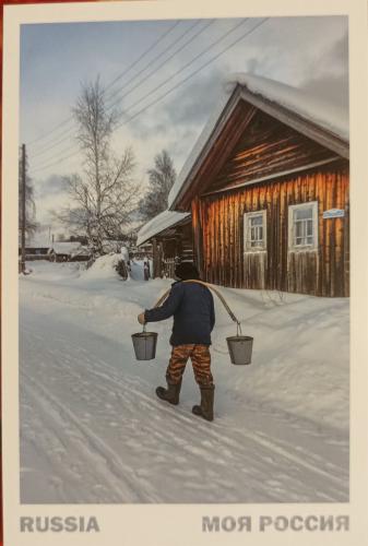 USSR - CIRCA 1980: Postcard printed in USSR shows man with bucket, circa 1980