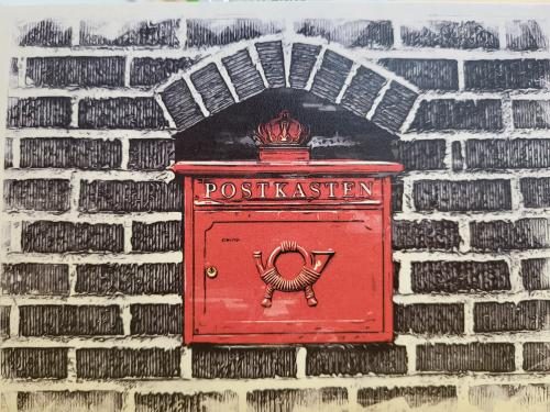 Mailbox on a brick wall background. Retro style. Hand drawn.