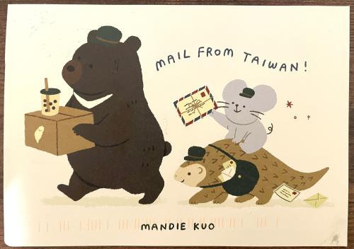 Illustration of a Christmas card with a bear and a mouse.