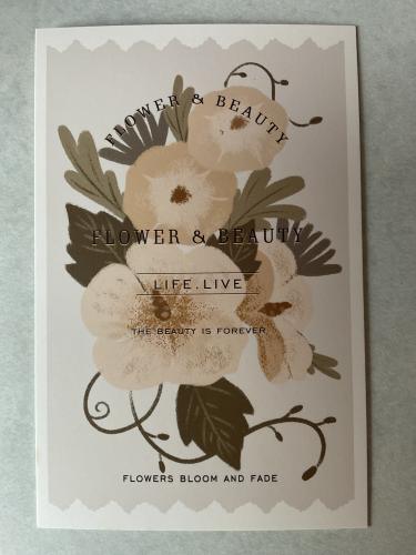 Wedding invitation card with hand drawn flowers and floral elements.