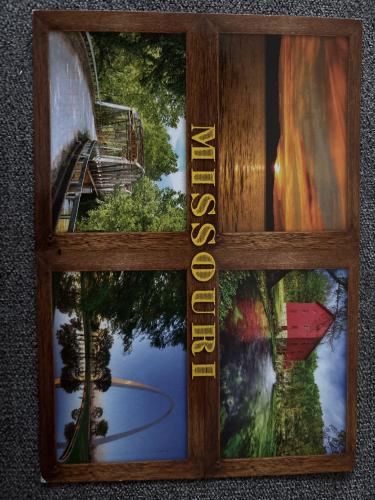 Wooden picture frame with a view of the river and wooden bridge