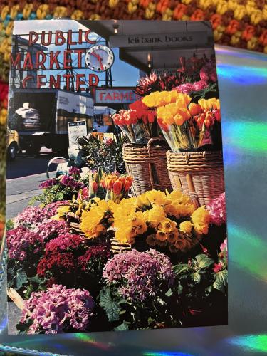 Bouquet of flowers in a wicker basket on the street