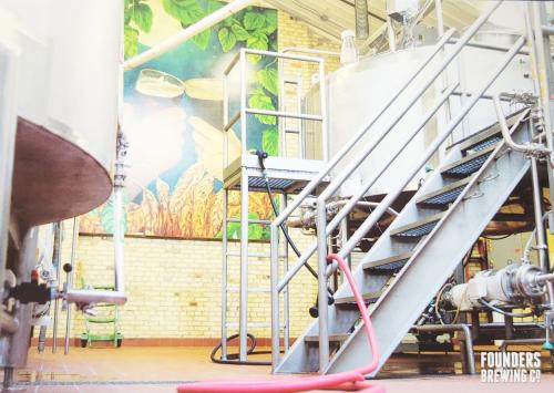 Stainless steel staircase in a factory for bottling beer.