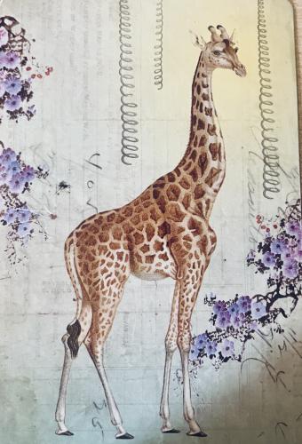 Giraffe with flowers and leaves on a grunge background.
