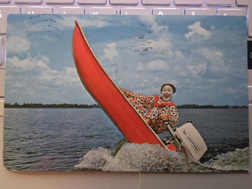 Boat on the water with a picture of a japanese character