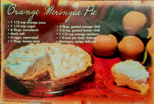 A box of freshly baked Meringue cake.