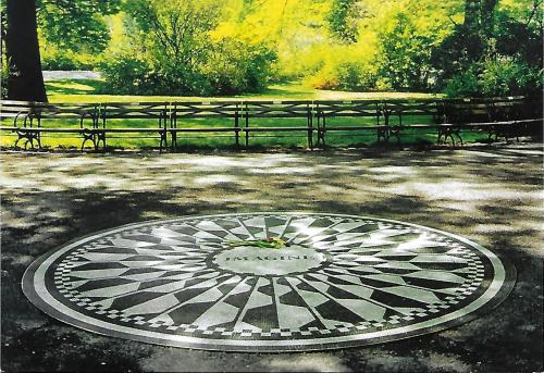 A watercolor painting of a round stone sign on a park bench