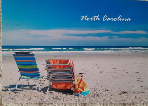 Vacation on the beach. Beach chair and umbrella on the beach