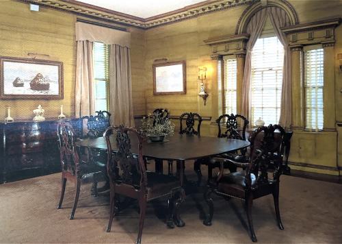 Interior of a room with a table and chairs in a palace