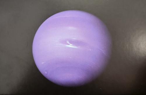 abstract background: purple planet on a black background. 3d render