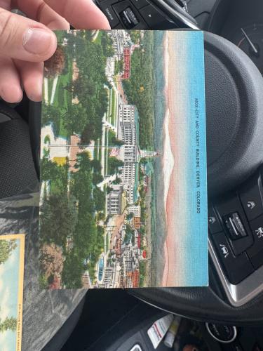 Man holding a map of Paris in a car. Man holding a map of Paris in a car.