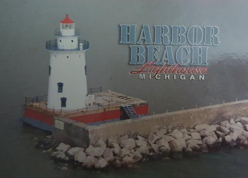 lighthouse in the middle of the sea with the text HABARBAGE