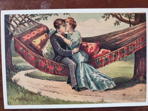 Postcard printed in Czechoslovakia shows couple kissing on the bridge