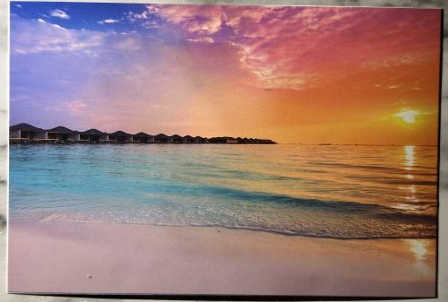 Sunset on the beach of the Maldives. Photo in retro style