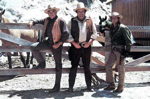 Cowboys on a horseback in the mountains of the Sierra Nevada