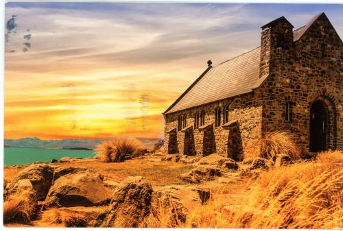 Old church at sunset in New Zealand. Photo in old color image style.